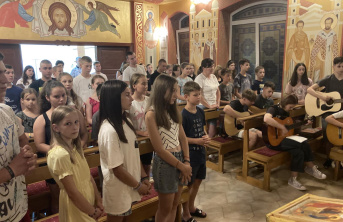 Summer camp youngsters at a Church service in Ukraine.