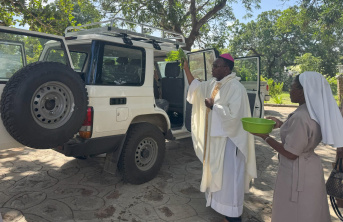 Sister and priest presented with a 4x4 vehicle