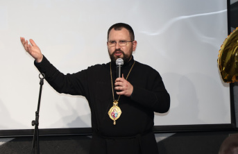 A priest giving a Homily