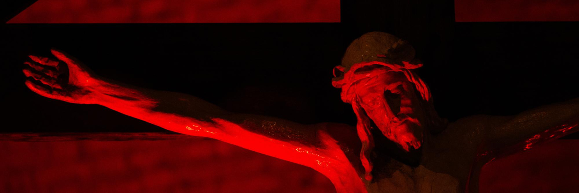 A crucifix lit up in red