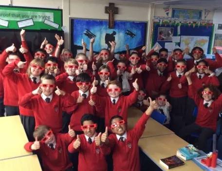 Primary School Students supporting ACN Red Wednesday with red sunglasses